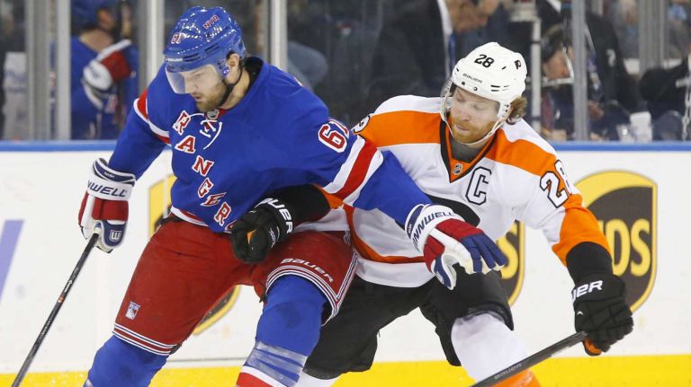 Rick Nash controls the puck in the third period against Claude Giroux #28 of the Philadelphia Flyers at Madison Square Garden on Wednesday, March 26, 2014.