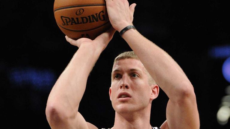 Nets' forward/center Mason Plumlee shoots a free throw against the Orlando Magic in the first half of an NBA basketball game at Barclays Center on Sunday, April 13, 2014.