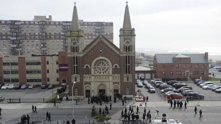 NYPD Officer Dennis Guerra remembered at memorial, funeral 42 Police arrive to pay respects at a funeral Mass at St. Rose of Lima Church April 14, 2014, in Far Rockaway for NYPD Officer Dennis Guerra. Guerra died April 9, 2014 after responding to the scene of a fire at a Coney Island high-rise on April 6.