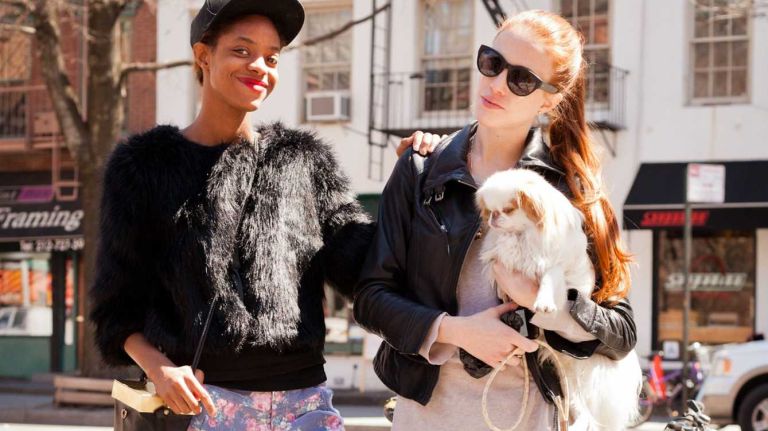 Model pals Kayla Miller, left, and Michelle Easter both pair shorts with black jackets during an afternoon stroll. Miller, of Harlem, wears an Evisu jacket, shorts she bought in Washington Heights, a Cobra Society bag and Camper shoes, while Easter, of the West Village, wears an All Saints jacket and shorts, Oliver Peoples sunglasses and rag + bone slip-ons. 