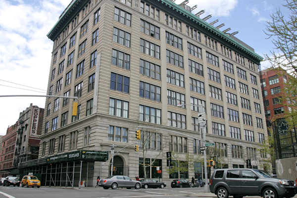 The Printing House, on Hudson St. between Clarkson and Leroy Sts., is located across from J.J. Walker ball field. A developer and the building’s condo board are playing hardball with the building’s staff.  Photo by Sam Spokony