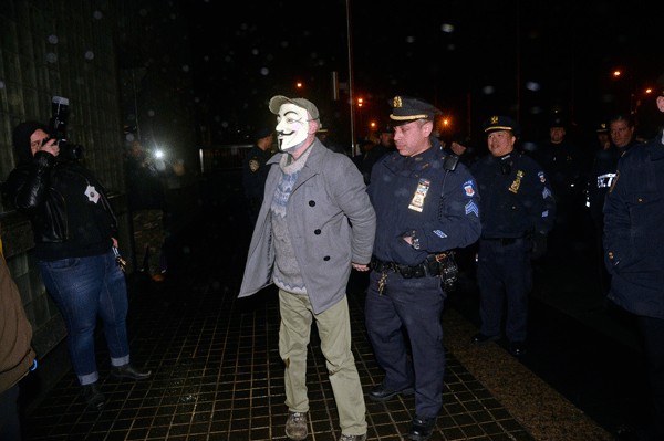 Richard Lynch of Staten Island, a constant presence in Zuccotti Park during Occupy Wall Street, being arrested at the Vietnam Veterans Memorial on April 4.  Photo by Jefferson Siegel