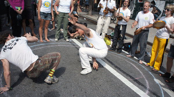 Martial-arts dancers from Capoeira Angola Quintal performed on Avenue C at E. Sixth St. at the Loisaida Festival on Sunday.  Photo by Liza Béar