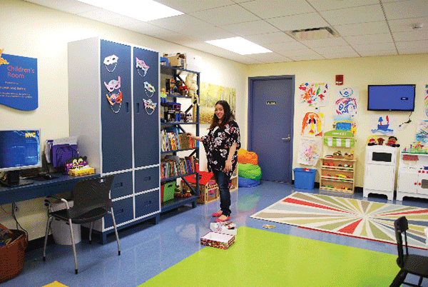 Domestic Violence Comprises Half of Chelsea Felony Assaults 2 Photo by Winnie McCroy A worker from the Mayor’s Office to Combat Domestic Violence watches clients’ kids as they access services.
