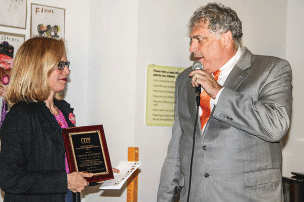 Wendy Chapman received an award from Manhattan Youth's Bob Townley, also a Community Board 1 member, in 2014. Downtown Express file photo by Tequila Minsky