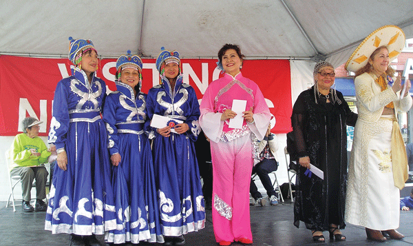 Senior Talent Show Gives Prizes, Gets Proclamation 1 Courtesy of Visiting Neighbors A Mongolian folk dance troupe (in blue) earned second place, in the Senior Talent Show. In pink: First Prize winner Li Yana.