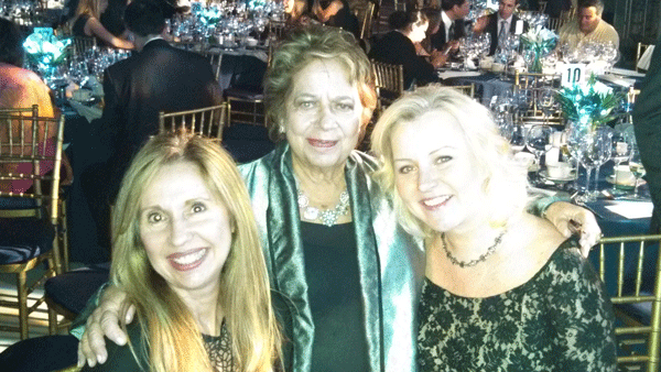 Elizabeth Butson, center, with Emma DeVito, president of VillageCare, left, and Villager Publisher Jennifer Goodstein.