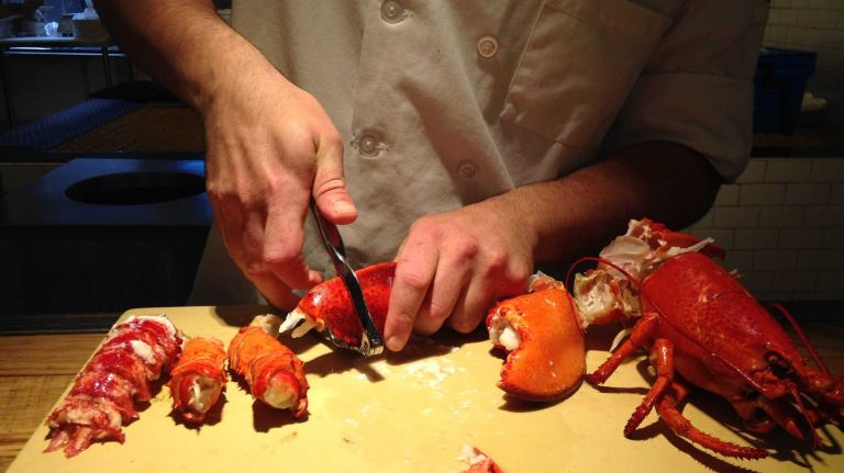 Use your claw cracker to then break open the larger part of the claw - fair warning, this will take some effort. You can use your lobster fork after it's cracked open to help get the claw meat out.