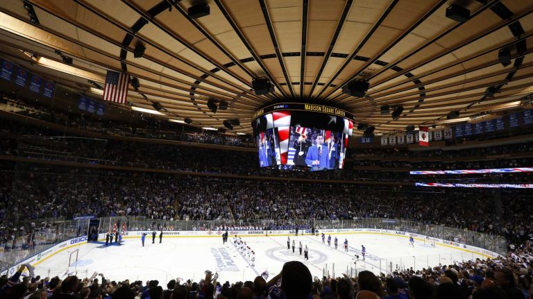 Fans cheer during the national anthem before Game 6 of the Eastern Conference finals at Madison Square Garden on Thursday, May 29, 2014.
