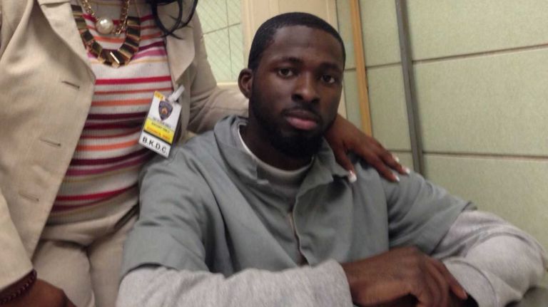 Kareem Potomont and his lawyer Audrey Thomas a Brookyn Detention Complex on May 8.