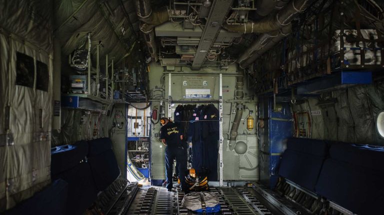 Jones Beach Air Show 2014 28 A Fat Albert airman secures the inside of the plane to prepare for weather reconnaissance, at Republic Airport in Farmingdale, on Friday, May 23, 2014.