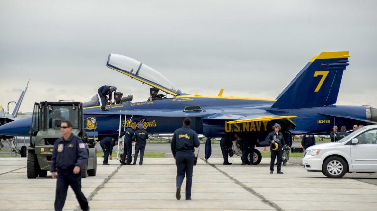 Jones Beach Air Show 2014 30 Staff and personnel work on the tarmac where the Blue Angels are stationed at Republic Airport in Farmingdale on Friday, May 23, 2014.