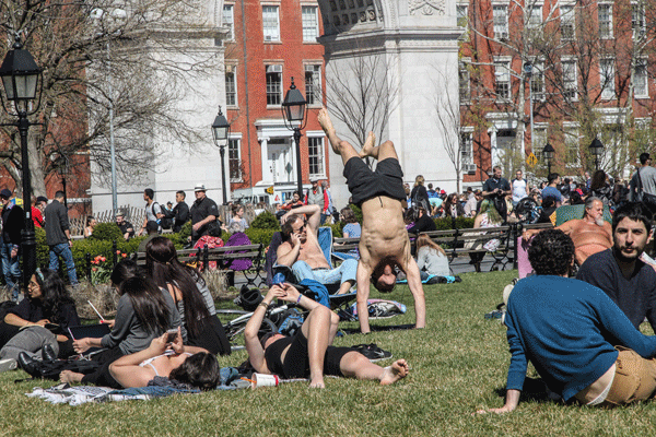 On one of the nicer days last week in Washington Square Park, shirts were off and skin was in.   PHOTO BY TEQUILA MINSKY