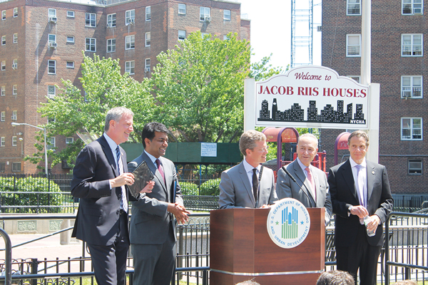 At Monday’s announcement of the breakwater project, from left, Mayor de Blasio; Zia Khan, of the Rockefeller Foundation; HUD Secretary Shaun Donovan; Senator Schumer; and Governor Cuomo.   PHOTO BY LINCOLN ANDERSON