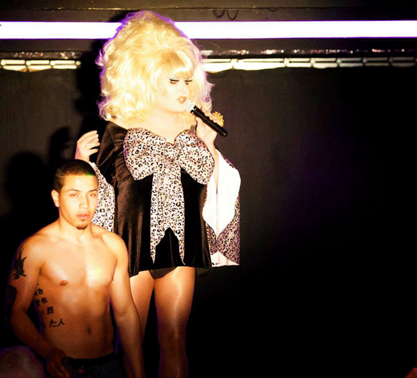 Wig On, Gloves Off 3 Last man standing: Lady Bunny and a member of the La Escuelita staff, at the tail end of an audience participation segment. Photo courtesy of DDPR