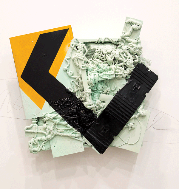 Courtesy of the artist and Mike Weiss Gallery Joe Fleming’s “The Flood #2” (2014 | Enamel, spray-foam, streetsign, metal, wood | 45x42x10in). On view at Mike Weiss Gallery, through June 14.