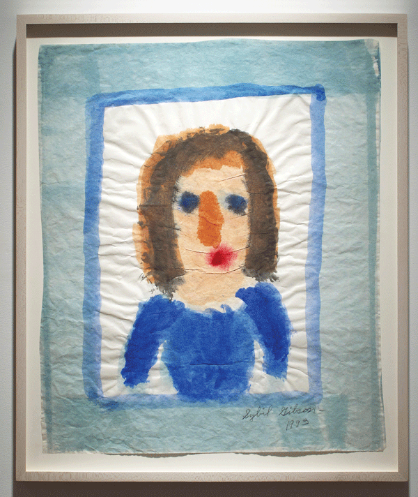 Sybil Gibson: “Portrait Blue Dress” (1993 | Acrylic on banner paper | Paper size: 20 x 18 inches; 50.8 x 45.7 cm | Frame size: 23.25 x 19.5 inches; 58.4 x 49.5 cm).  Courtesy of Woodward Gallery,  NYC and the Estate of Sybil Gibson