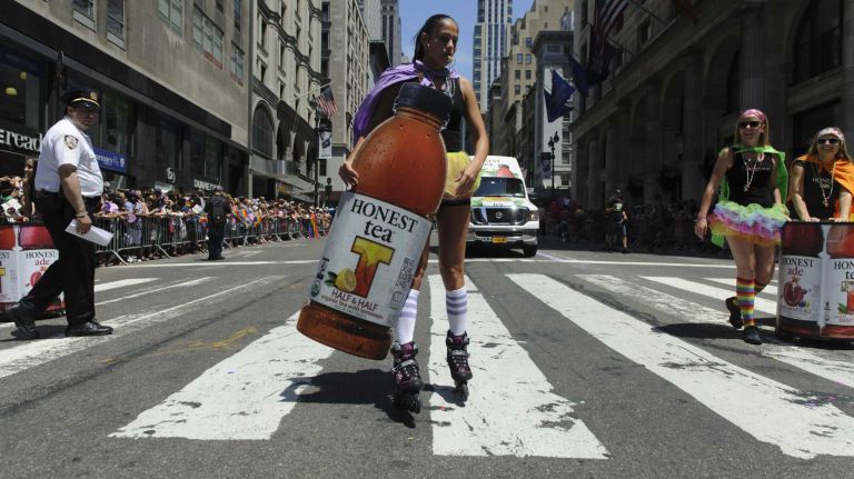 Corporate sponsors participate during the New York City pride parade in Manhattan on Sunday, June 29, 2014.
