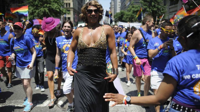 Participants walk during the New York City pride parade in Manhattan on Sunday, June 29, 2014.