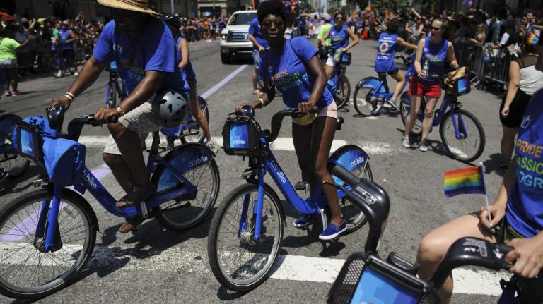 Citi Bike and other corporations march during the New York City pride parade in Manahttan on Sunday, June 29, 2014.