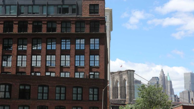 View of the Brooklyn Bridge from underneath the Manhattan Bridge in Dumbo on June 6, 2014. 