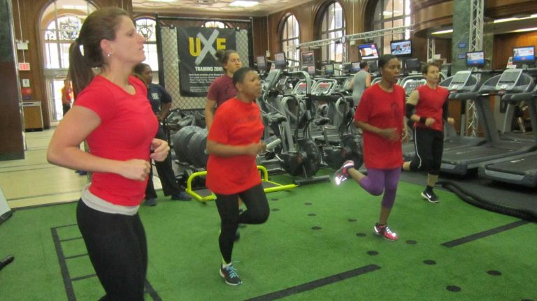 Free trainings offered to prospective female firefighters 2 Prospective female firefighters train at the Wall St. New York Sports Club.