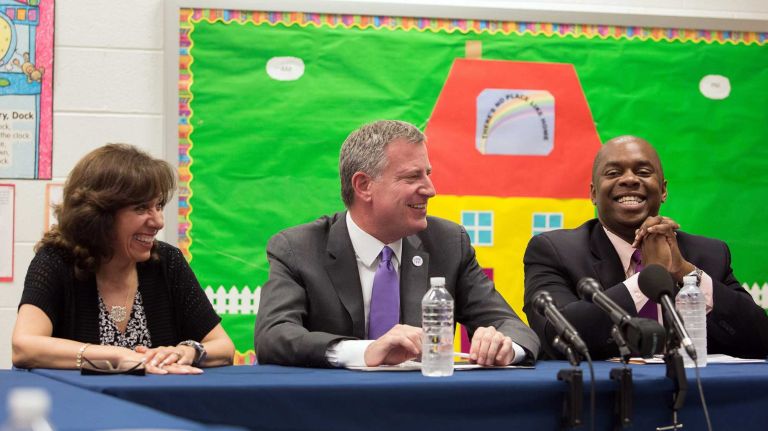 Principal Robin Connolly, Mayor Bill de Blasio and Deputy Mayor Richard Buery speak during a roundtable discussion at PS 239 Q in Queens on June 3, 2014.
