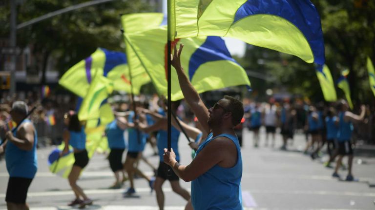 Participants perform during the New York City pride parade in Manhattan on Sunday, June 29, 2014.
