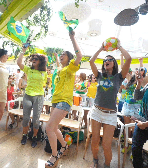 Soccer scores a goooooal! as Cup fever grows in U.S. 1 Brazil fans rejoiced at Sushi Samba, at 87 Seventh Ave. South, as their team trounced Cameroon, 4-1, in World Cup play Monday. Photos by Jason B. Nicholas