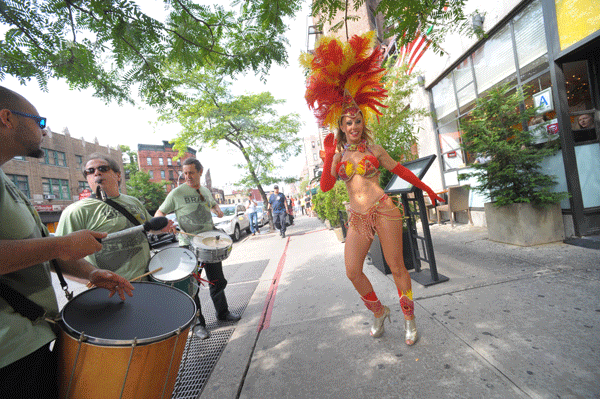 A dancer samba’d outside Sushi Samba before the game.