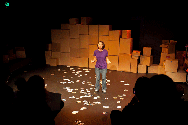 Nothing but boxes and memories: “Forgetting The Details” has Nicole Maxali reconstructing her relationship with a victim of Alzheimer’s.  Photo by Ray Jun