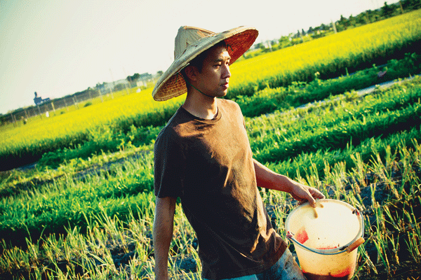 Set it off: Peaceful revolutionary Ru uses explosives made from local crops, to make his point.   Photo courtesy of the filmmakers & AAIFF