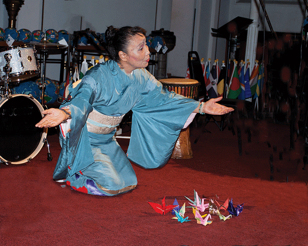 Atsuko Yuma, seen here in a 2013 performance of “Mother Tsuru,” is a featured artist in this year’s Universal Peace Day “Concert for a World Without War” (Aug. 5, at St. John’s Lutheran Church). Photo by SuZen