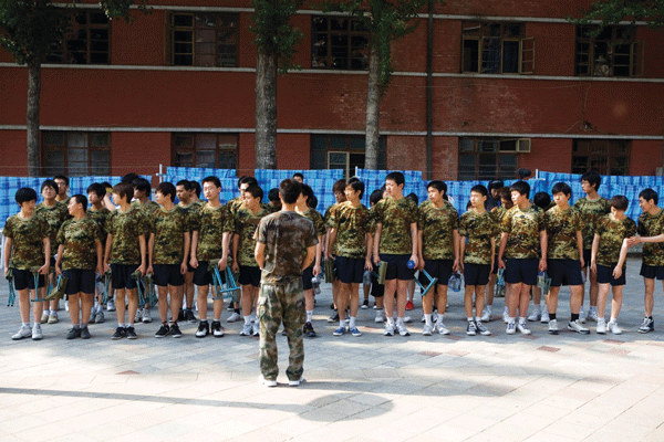 Web junkies fall into formation at Daxing Boot Camp, Beijing Military Hospital.  Courtesy of Kino Lorber, Inc