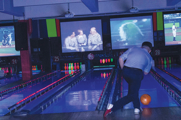 Bowling at Bowlmor Lanes on its last night on University Place.   Photo by Zach Williams