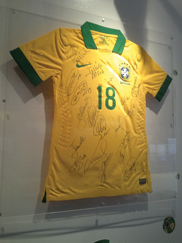 On Berimbau’s wall is a No. 18 jersey of midfielder Paulinho, signed by the whole Brazilian national team, that Julio Cesar brought to the restaurant.  Photo by Sergei Klebnikov
