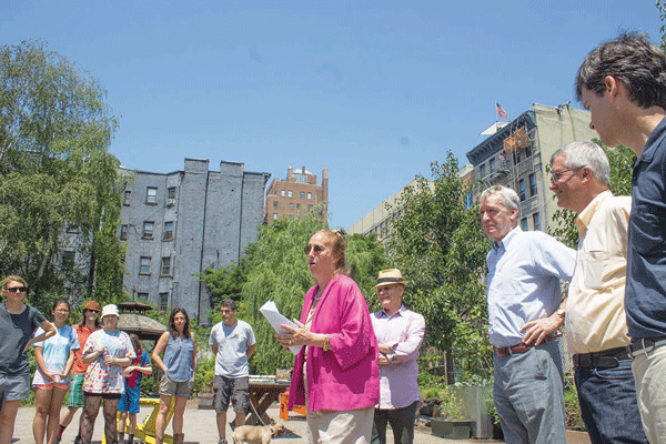 Borough President Gale Brewer, in La Plaza Cultural, spoke at the announcement of the composting grants. To the right of her, from left to right, were Brendan Sexton, Peter Kostmayer, Assemblymember Brian Kavanagh and state Senator Brad Hoylman.    Photo by Zach Williams