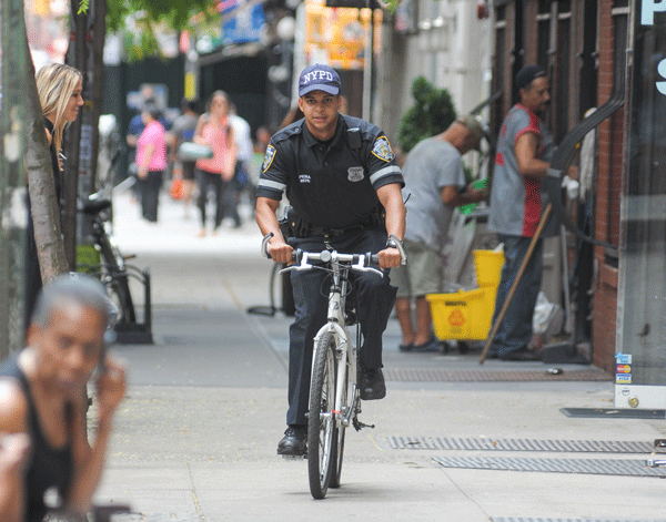 Police Blotter, Week of July 31, 2014 2 Wheels of justice turn in Nolita? Hey! Someone give that guy a ticket! A bike-patrol police officer was caught riding his official police Trek bike on the sidewalk in on Mott St. between Prince and Spring Sts. It’s great to see police on bicycles — but does this mean no one else will get tickets when they pedal on the pavement? Photo by Jason B. Nicholas