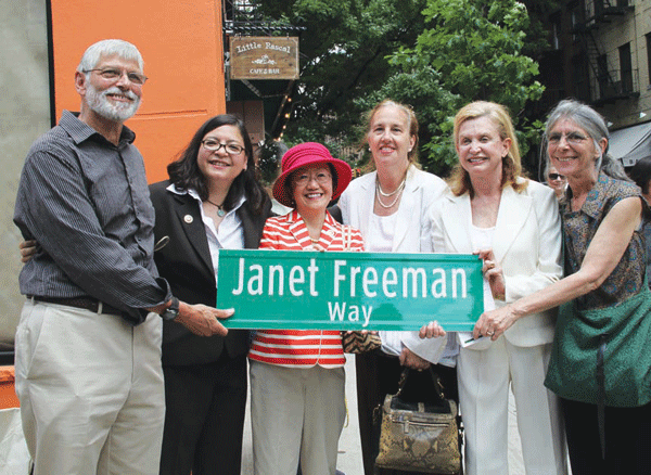 Holding up an honorary co-naming sign that was given to Freeman’s family members, from left her brother, Ed, Councilmembers Rosie Mendez and Margaret Chin, Borough President Gale Brewer, Congressmember Carolyn Maloney and Freeman’s sister, Pixie.  Photos by Tequila Minsky