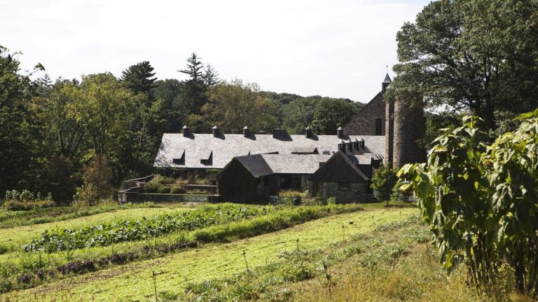 A view of Blue Hill at Stone Barns from a nearby field.