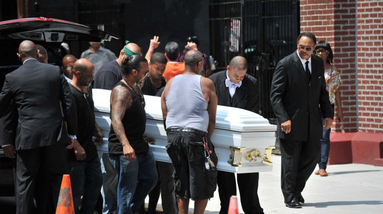 Family and friends move the casket of Eric Garner into the Bethel Baptist Church in Brooklyn on July 23, 2014.  