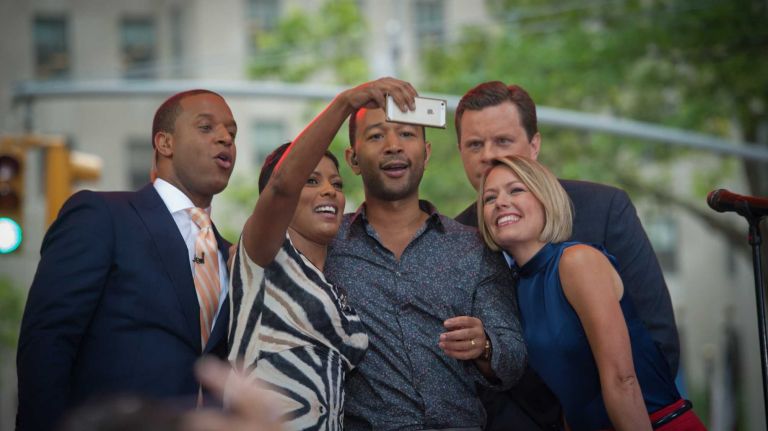 Today Show co-host Tamron Hall takes a selfie with John Legend following his performance on the Today Show, Thursday, July 10, 2014.