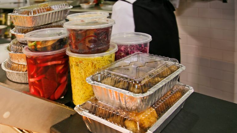 Tip of the day: Do right by delivery workers 2 Food takeout order being prepared.