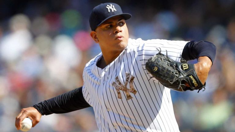 Dellin Betances of the Yankees pitches in the eighth inning against the Cincinnati Reds at Yankee Stadium on Sunday, July 20, 2014.