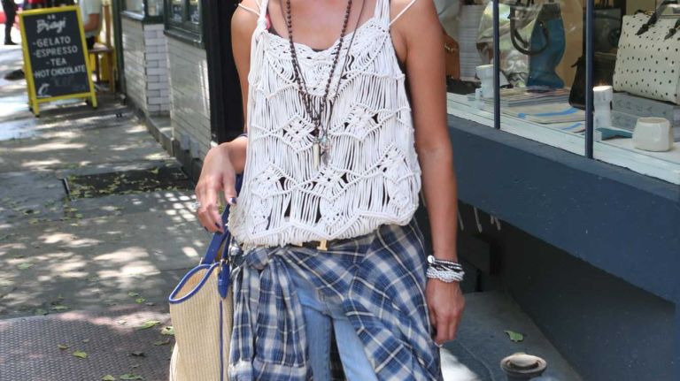 Brenda Lee, 50, visiting from Albany, wore her favorite boyfriend jeans and a Denim Supply top while shopping on Elizabeth street. 