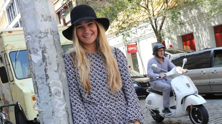 Isabel Murphy, 19, a Cambridge student visiting from Bristol, England, wore a Zara jumper and Urban Outfitters hat while exploring SoHo with a friend on July 25, 2014. 