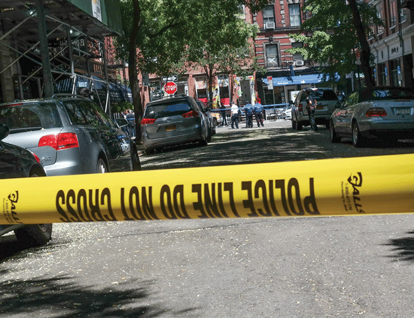 Police blocked off Jones St. on Monday afternoon south of the shooting scene.  Photo by Tequila Minsky