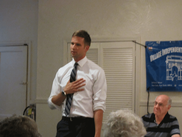 Erik Bottcher made the case for re-electing Governor Cuomo.  Photos by The Villager