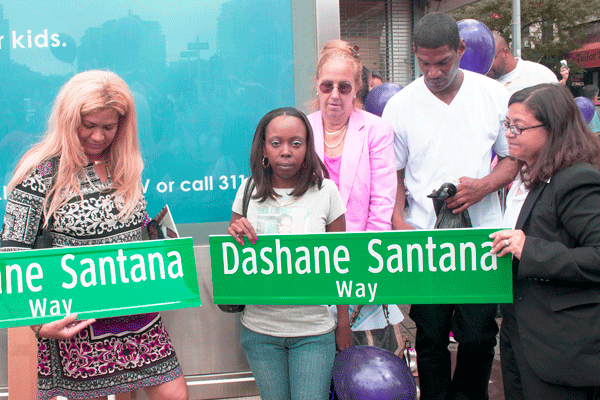 At Sunday’s dedication of Dashane Santana Way, from left, Teresa Pedroza, Shamika Benjamin — Dashane’s mother — Borough President Gale Brewer, Brian Bacchus  Dashane’s grandfather — and Councilmember Rosie Mendez.   Photo by Zach Williams