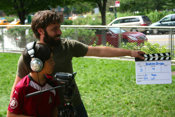 The filmmaking class is shooting a scene in nearby West Thames Park. 